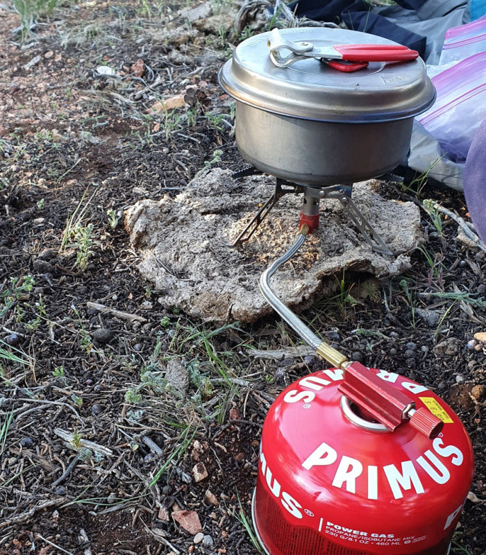 2022 May 4th US Hayduke hike-Novel use of a cow pat to keep the stove out of the dirt!