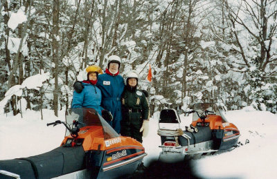 Sandy and Dad snowmobiling MLR2020.jpg
