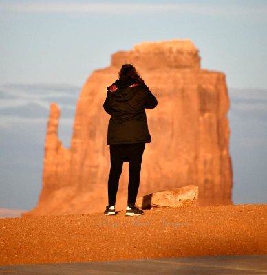 Tourist and Mitten Butte at sunset, Monument Valley, Navajo Tribal Park, Navajo Nation, Arizona 666 