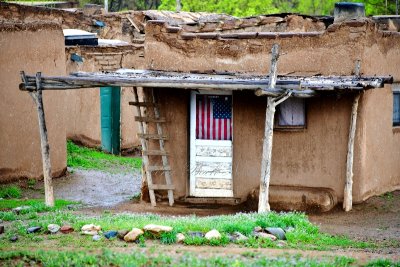 US Flag in adobe home, Hlaukkwim, Taos Pueblo, New Mexico 138 