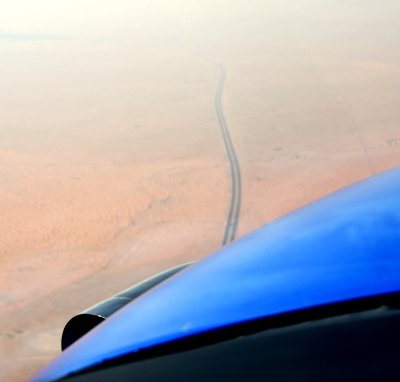 Quest Kodiak airplane follows highway, Riyadh Region, Saudi Arabia 191a 