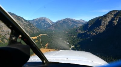 Cessna 180 on long final to Lost River Airstrip, Mazama, Washington 394  