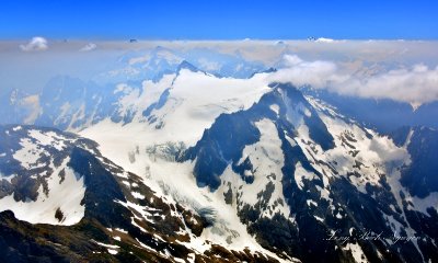 Paul Bunyans Stump, Colonial Glacier, The Needle, The Horseman, Snowfield Peak, Neve Glacier, Primus Peak, Tricouni Peak 