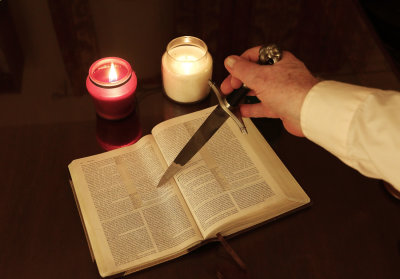Is this offensive Because it Looks Like I am Stabbing the Bible!?!