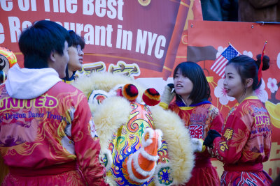 Discussing who will wear the dragon head ?