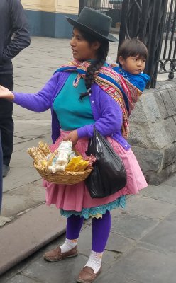 A local and her son in Cusco