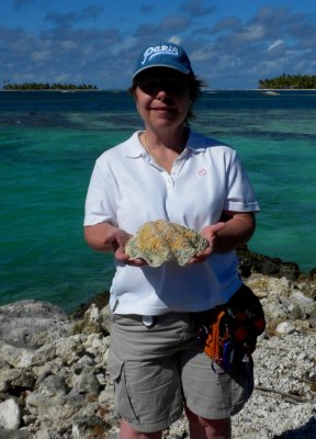 Michelle Holds a Large Clam Shell