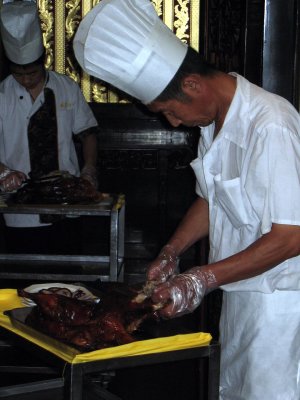 Cook Preparing Peking Duck