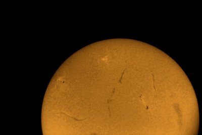 Solar Filaments in Gold