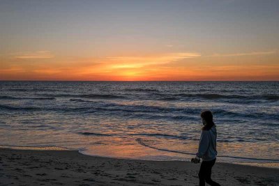 She was always the girl you saw bopping down the beach with the radio...