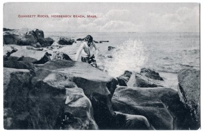 Quansett Rocks, Horseneck Beach, Mass. (woman climbing over rocks)