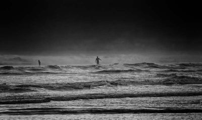 Surfers in the Mist 