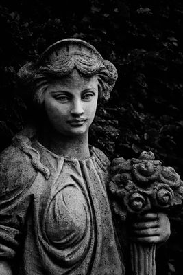 Statue with flowers  