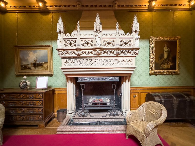 The Hall Fireplace - the fireplace sets out the Gibbs family's values. The statue depict the four cardinal virtues - Tyntesfield