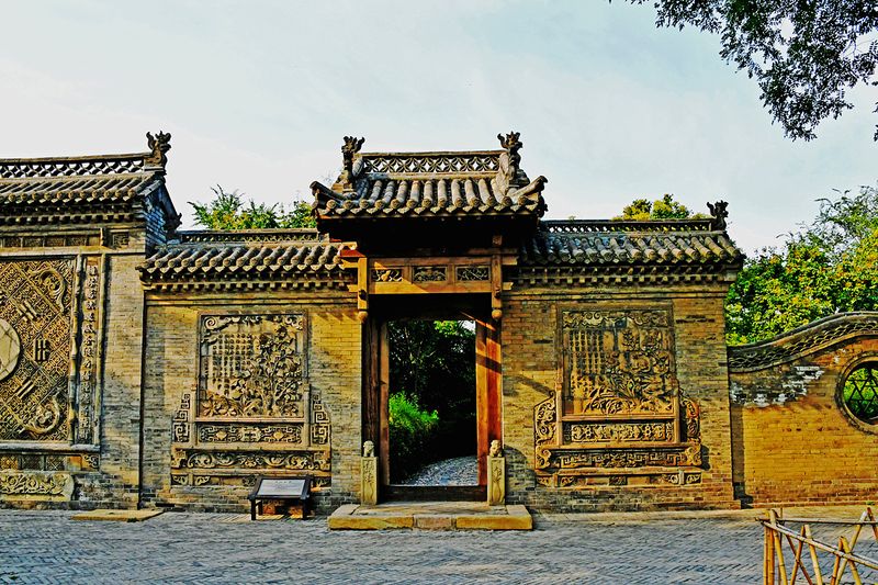 07_Every courtyard contains brick, wood and stone sculptures.jpg