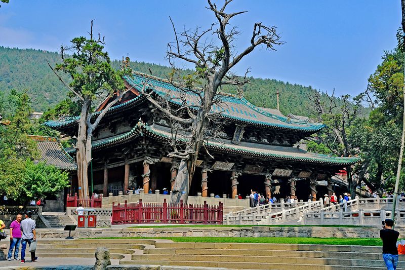07_Main temple, Hall of the Holy Mother, with dragons carved on wooden pillars.jpg