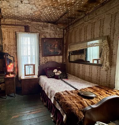 Madams room! Much nicer and has heat. She got 50%, the body guard got 25% and the girl doing all the work, 25% or $1.25. So that