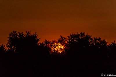 The sun descends into twilight