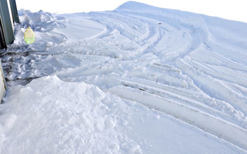 Driveway that was plowed mid-storm