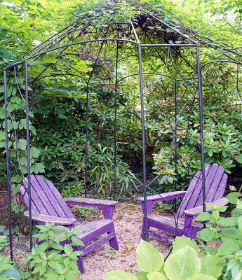 Seating area with purple chairs.
