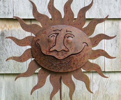 Rusty sun sculpture.