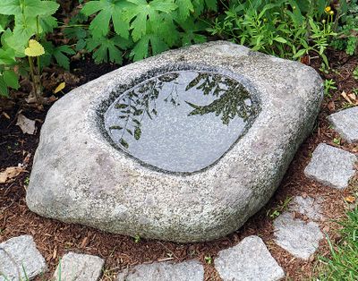 Stone birdbath.