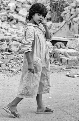 Child with Bombed Houses