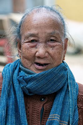 Kham, Tai Lu Woman, 73, Weaver