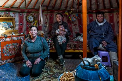 Mongolian Family in Their Yurt