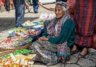 Elderly K'iche Woman Selling Candy