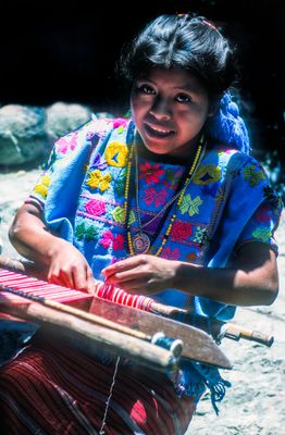 Mam Girl Using Backstrap Loom to Weave
