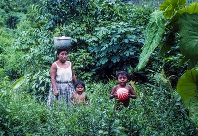 Maya Q'eqchi' Family, Back from the RIver