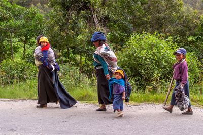 Quechua Family Walking Home