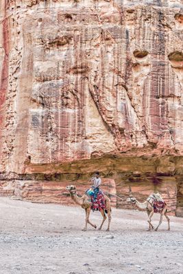 Arabic Boy Riding Camel in Petra