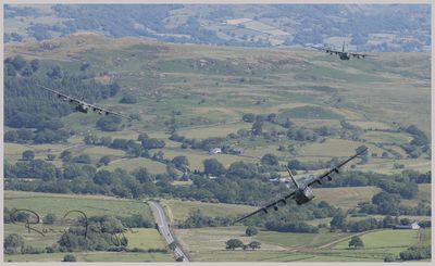 C-130 Hercules.This is them on the final flight through the Mach Loop