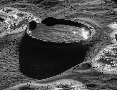 .Puddle With Sun Flares