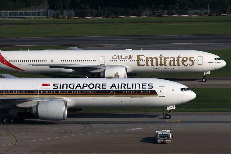 EMIRATES SINGAPORE AIRLINES BOEING 777 300ERs SIN RF 002A1771.jpg