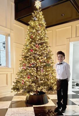 Zeke
Jeremy, Cindy, Devon and Zeke didn't get to make the trip, but Cindy sent us some photos of the kids with their Christmas tree as they were getting ready for an event at school.