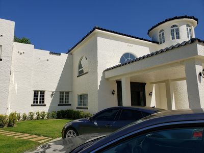 The entrance to the house, with a turret above. 
