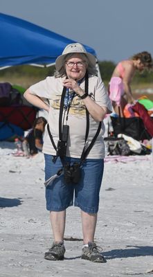 Grandma enjoys the spectacle from a distance.