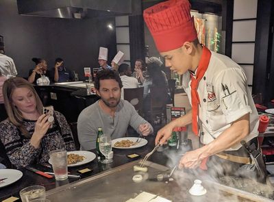 Angela and Seth watch Elvis construct an 'onion volcano.'