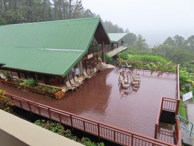 TRIP DAY 9 (Tue, 4/4): 

At Villa Lapas, I talked to a fellow birder who had been at Hotel Bougainvillea while we were there. His group went to Arenal, while we went to Drake Bay, before going to Villa Lapas. He told me the deck off the dining room at Arenal had not been dry the whole time they were there. Such was our experience too. This is the view from the partly enclosed 2nd story viewing deck at the lodge 