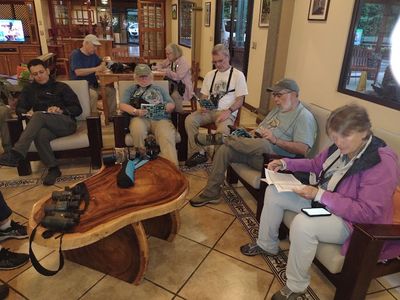 Reviewing our checklists at the end of the day in Arenal Observatory Lodge: Erick, Steve, Dawn, Mary, Ross, Michael and Patty
Photo by Andy Johannson 