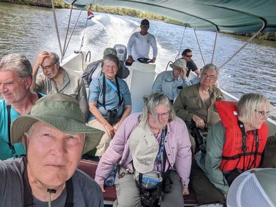 After our stop at Sierpe, we headed up the river.
Ross, Steve, Michael, Patty, Dawn (behind Patty), our boat captain, Mary, Andy, Jos, Carolyn (behind Jerry), Jerry, Becky