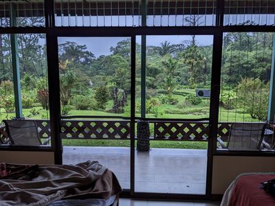 TRIP DAY 10 (Wed, 4/5): 

The view of some of the gardens at Arenal Observatory Lodge, through the wall of windows of our room.