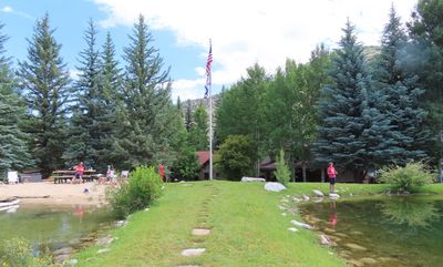 There were two ponds, one with a beach (L) and one more for fishing (R). This is the view back toward the ranch house from the south end of the dike that separates the two ponds.