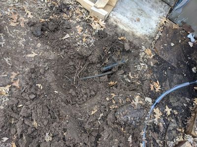 They had to expand the size of the pad for the new, larger unit and, in digging space for it, discovered one of our sprinkler heads was in the way.