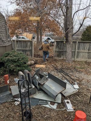 Then they started hauling all the pieces out to the curb.
