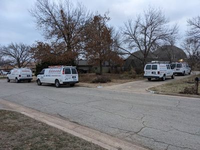 At one point there were 4 trucks of guys working, in addition to the truck that brought the unit to the house.