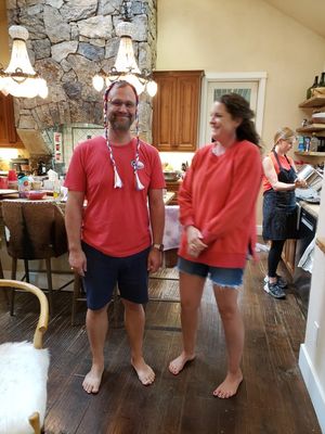 Josh models his holiday hair style for Jenny while Angela labors in the kitchen.